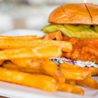 Buffalo Chicken Sandwich · Toasted bun, breaded or grilled chicken breast tossed in our buffalo sauce, coleslaw, and pi...
