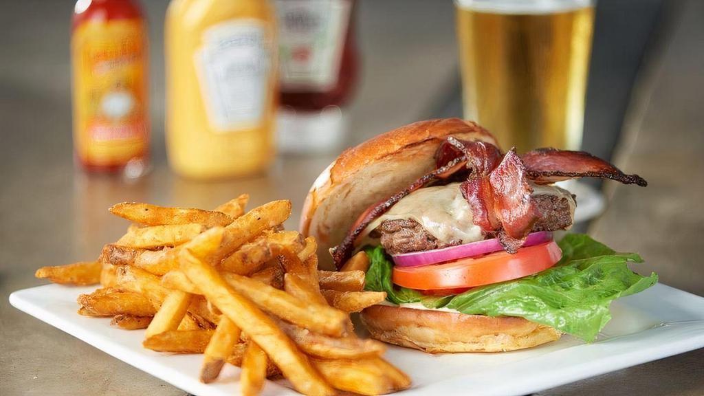 Turkey Burger · Turkey patty with lettuce, onions, Tomatoes, Pickles, & our homemade Cajun aioli. Served with french fries. Cheese of your choice can be added upon request.. Add avocado  or Bacon for $2.00.