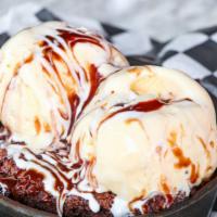 3 Chocolate Brownie · Made with Ghirardelli chocolate & topped with vanilla ice cream