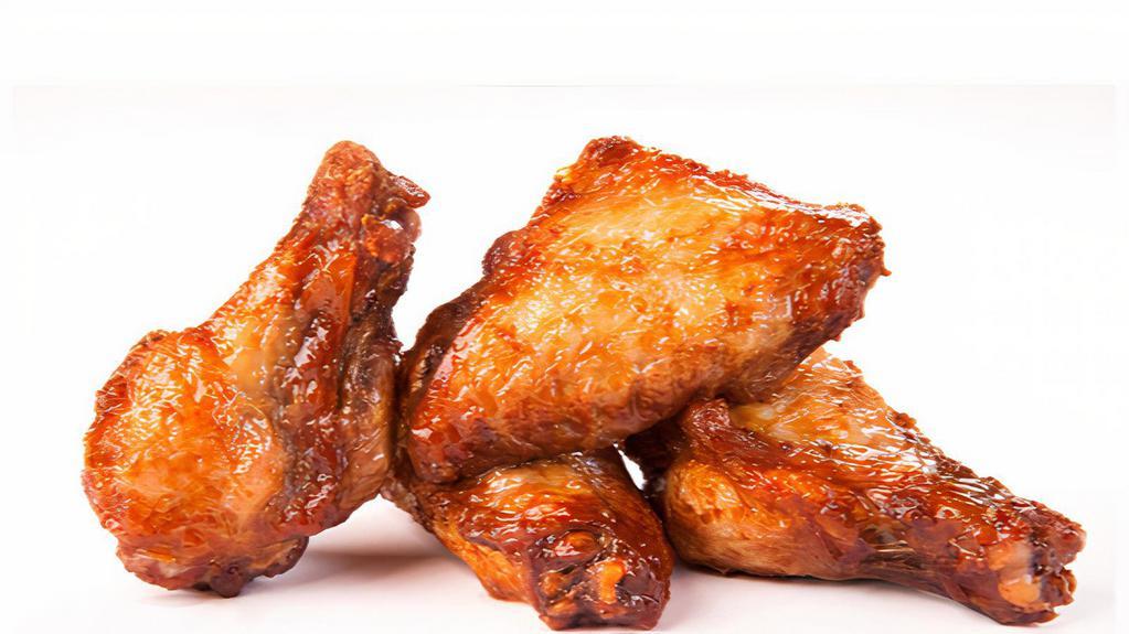 Buttermilk Ranch Wings · Famous buttermilk ranch sauce tossed on wings with customer's choice of bone-in or boneless! Served with choice of ranch, bleu cheese, BBQ, honey mustard or sweet & sour side sauce!