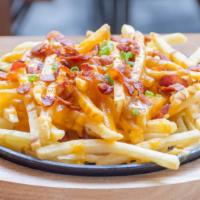 Bacon Cheese Fries · Bacon strips cut and tossed on melted cheese fries.
