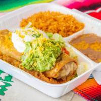 Chimichanga With Both Guacamole & Sour Cream · Golden, crisp and delicious. With both guacamole and sour cream, lettuce, tomatoes, cheese &...
