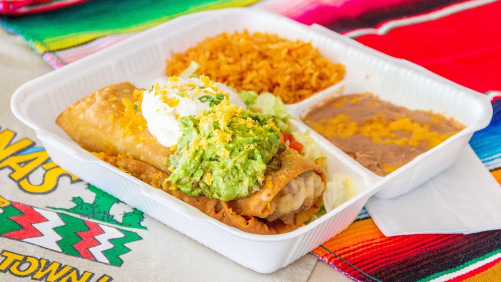 Chimichanga With Both Guacamole & Sour Cream · Golden, crisp and delicious. With both guacamole and sour cream, lettuce, tomatoes, cheese & onions. Your choice of burro.