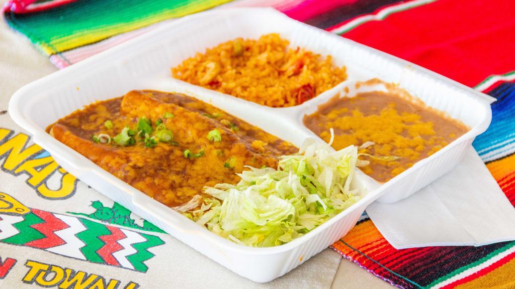 Combo 10-(2) Red Or Green Enchiladas · Served with rice and beans.