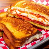 Pepperoni Pesto Grilled Cheese · Deli Style Pepperoni, Provolone and American Cheese, Basil Pesto, Crushed Hot Pepper Spread,...
