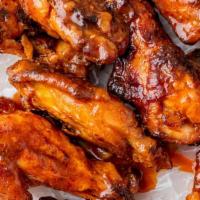 12 Pcs Wings · 12 Pcs Hot wings in one of our signature sauces