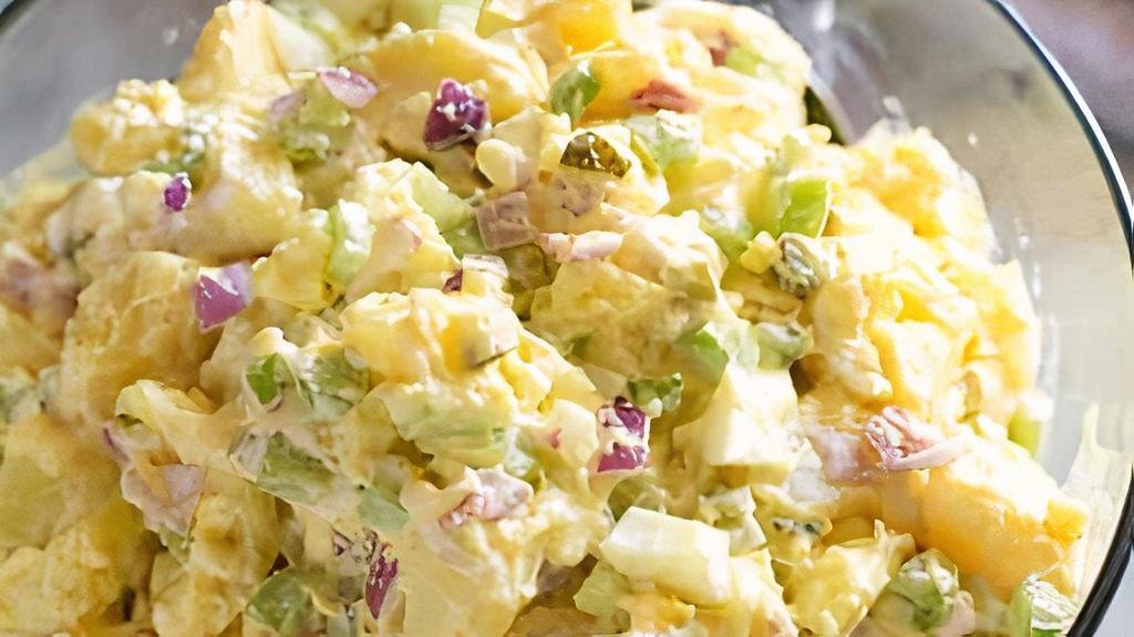 Large Ensalada De Papa / Potato Salad · Potato salad is a dish made from boiled potatoes and a variety of other ingredients. It is generally considered a side dish, as it usually accompanies the main course.
