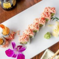 Yummy Roll · Shrimp tempura avocado inside topped with spicy crab, yummy sauce, &eel sauce.