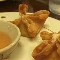 Crab Rangoon · Fried wonton stuffed with crab meat and cream cheese.