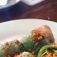 Summer Roll · Fresh vegetables wrapped in rice paper served with a sweet chili sauce and a peanut sauce. C...
