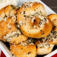 Garlic Knots With Whipped Ricotta · Always a crowd favorite! Fresh baked knots basted with garlic butter and herbs and served wi...