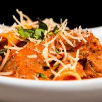 Spicy Sausage Rigatoni Alla Vodka · Jimmy's spicy sausage and penne tossed in marinara cream sauce, topped with shredded parmesa...