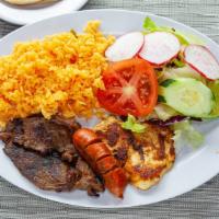 Picadera La Familiar(Plato Mixto) · HOUSE SAMPLER SERVED WITH STEAK, GRILLED CHICKEN BREAST, SAUSAGE, RICE, SALAD AND TWO HANDMA...