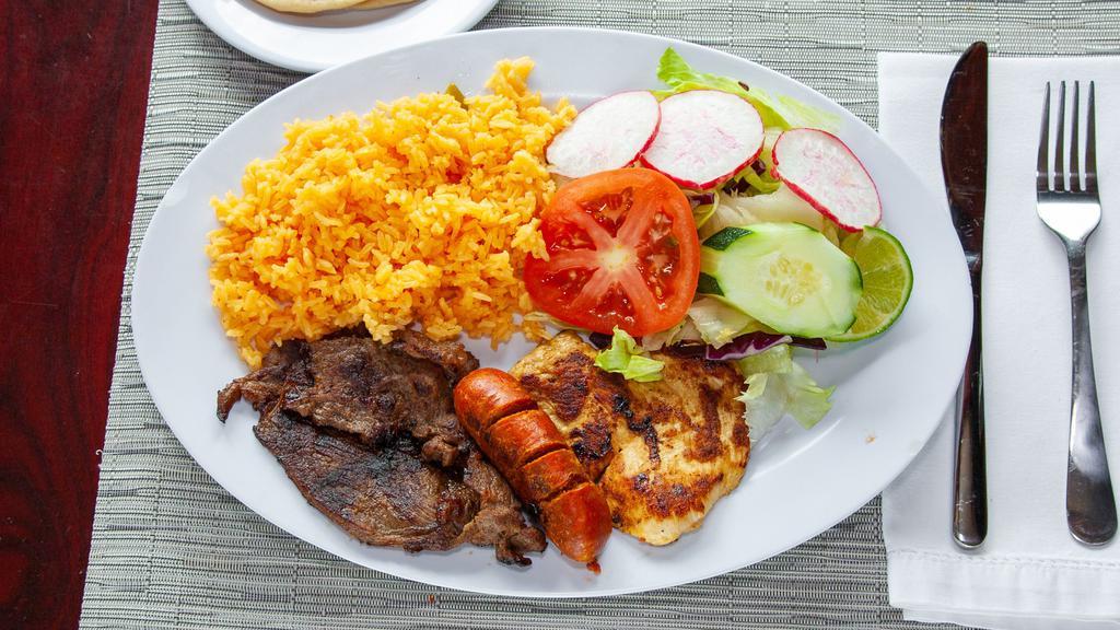 Picadera La Familiar(Plato Mixto) · HOUSE SAMPLER SERVED WITH STEAK, GRILLED CHICKEN BREAST, SAUSAGE, RICE, SALAD AND TWO HANDMADE TORTILLAS.
