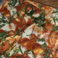 Margarita Pizza · Crushed tomato, sea salt, basil, olive oil,and fresh buffalo mozzarella.