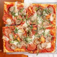Lombardi Pizza · Crushed tomato, buffalo mozzarella, pepperoni, mild sausage, parmesan, Romano, basil and oli...