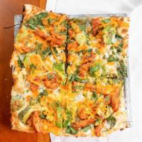 Bbq Chicken Pizza · Roasted garlic cream, barbecued chicken thighs, avocado, corn, sweet onion, spinach, mozzare...