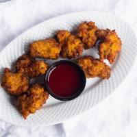 Vegetable Pakoras · Vegetables dipped in butter and fried.