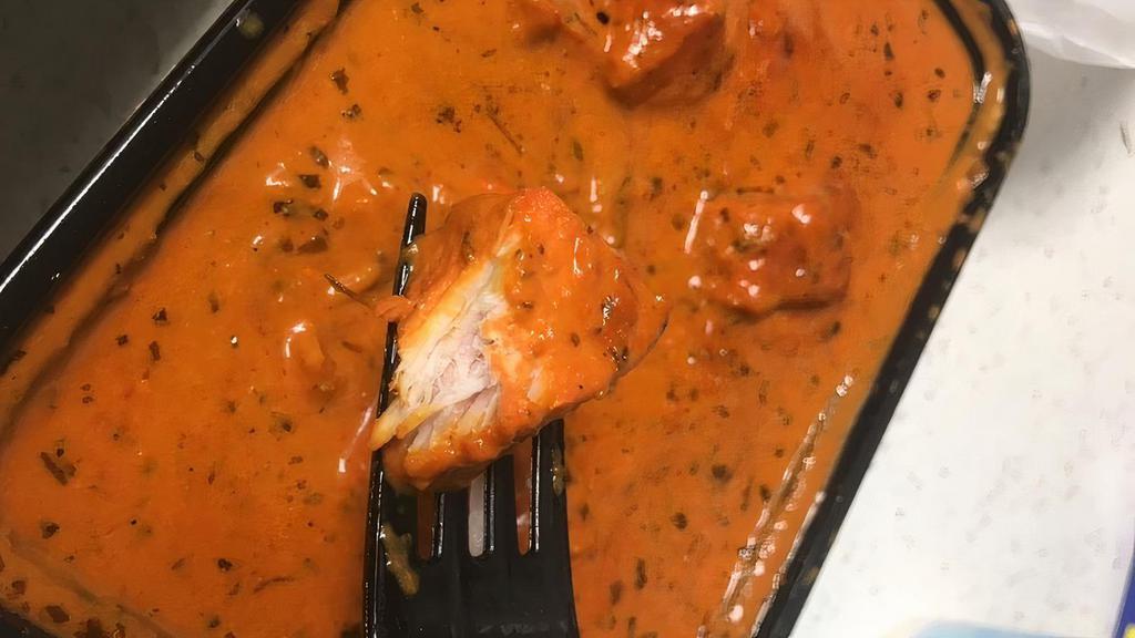 Chicken Tikka Masala · Charcoal roasted chicken cubes in moderately spiced sauce.