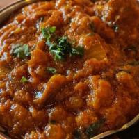Lamb Bhuna · Lamb cooked with fresh ground spices in a karahi (special pan)
