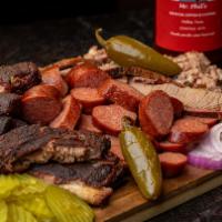 Bbq Family Feast · Feast-two lbs. Choice of meat, two quarts sides, and toast.