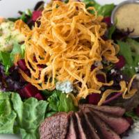 Steak Salad · Grilled sirloin, artisan greens, Bleu cheese, pickled baby beets, tabasco shoestring onions,...
