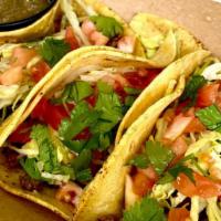 Homestyle Street Tacos · Seasoned Impossible Meat in a Corn Tortilla, Topped with Lettuce & Tomato - Served with Home...