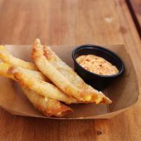 Wonton Cheese Sticks · Chao Cheese, Wonton Wrapped & fried to order. Served with Gochujang Aioli
