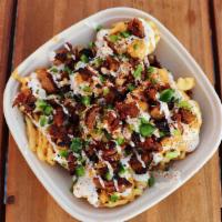 Loaded Fries · Beer Battered Waffle Fries loaded with Credo Queso, Spare Rib & Jalapeños Topped with Garlic...