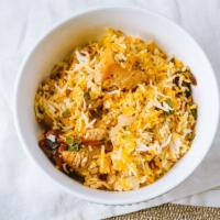 Chicken Biryani - R · Hot. A Rich and Flavorful Layered Indo/Pak Dish mixed with Chicken, Rice, Spice and everythi...