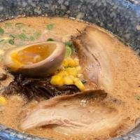 Tonkotsu Ramen-Pork (No Spicy) · Pork slice, half soft egg, green onion, fugus, mushroom, and corn. Contain half soft egg. We...