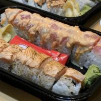 Kiriba Roll · Tempura shrimp and cucumber roll, layered with seared salmon on top, drizzled with unagi sau...