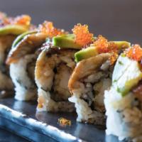 Dragon Roll · Shrimp tempura and cucumber roll topped with broiled eel, avocado, drizzled with unagi sauce...
