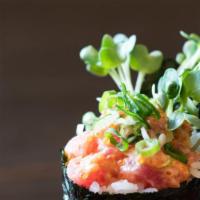 Spicy Tuna Hand Roll · Chopped tuna mixed with green onion spicy mayo sauce and cucumber.
