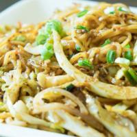Chicken Yakisoba · Japanese egg noodles stir-fried with chicken or beef, onion, cabbage, and carrots in house y...