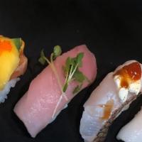Sushi Sampler · Four pieces chef's recommend nigiri.