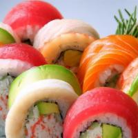 Rainbow Roll · Crabstick, avocado inside, topped with tuna, salmon, white fish and avocado.
