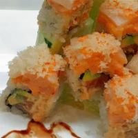 Snow Mountain Roll · Spicy salmon, avocado inside, topped with lobster salad, white tuna, crunchy flakes, spicy m...