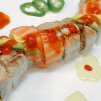 Maryland Roll · Shrimp tempura with sweet mango inside, topped with real crab meat, salmon and avocado, unag...