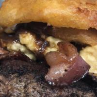 The Kitchen (1 Lb.) · Angus burger stuffed with cheddar cheese, fried pickles, hickory smoked bacon, onion rings, ...