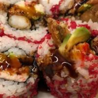Crunchy Shrimp  Roll · Shrimp, crab mix and avocado. -Topped with tempura cruncy served with eel sauce