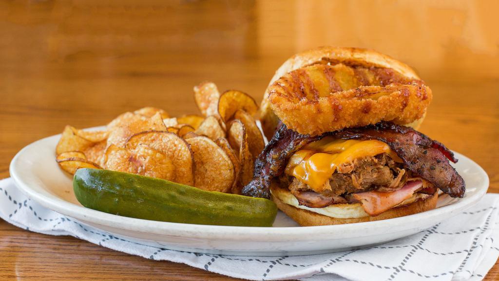 The Pigonater · Smoked and sliced thin pork loin ham, candied bacon, smoked cheddar, BBQ sauce & o-ring