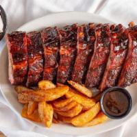 Smoked Baby Back Rib Dinner - Half · Served with fries & jalapeno coleslaw