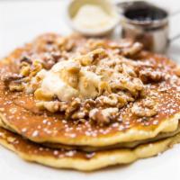 Cinnamon Swirl Pancakes · Buttermilk pancakes, cinnamon swirl, maple frosting, walnuts.