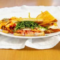 Morning Glory Sandwich · Fried egg, bacon, smoked gouda, tomato, arugula, onion, lemon aioli on sourdough served with...