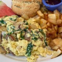 Joe'S Special · Two egg scramble, chicken sausage, spinach, mushrooms, onions, served with a scone and cotta...