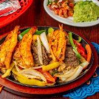 Fajitas · Mixed fajita, shrimp, beef, and chicken or just shrimp. Served with rice, beans, guacamole, ...
