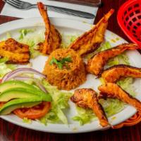 Grilled Shrimp (Camarones A La Plancha) · Grilled shrimps. Served with salad, rice, and tortillas.