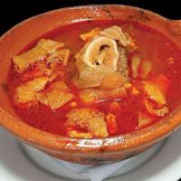 Menudo · Hearty tripe soup. Served with onion, cilantro lime, and soft corn tortilla on the side.