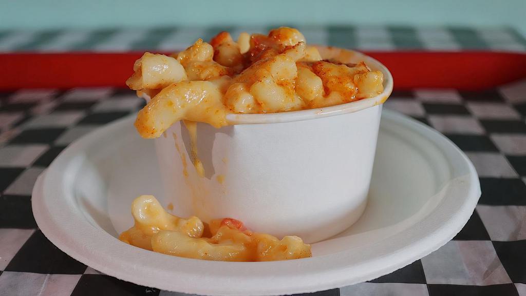 Pimento Mac & Cheese · Our southern Mac n' Cheese with cheddar, American and pimento